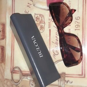 UV3 Sunglasses and a Bulova case